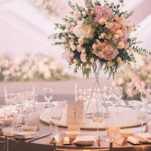 YN's new design wedding white flower arrangement with silk red roses and artificial flower balls.